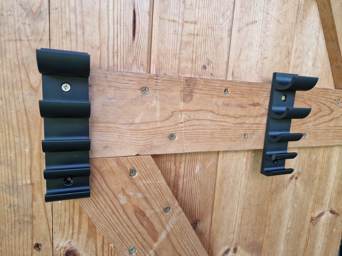 Wall mounted long drill bit holders